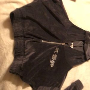 Size medium, brand rue 21, made in china, not worn, says in rhinestones “K bye”